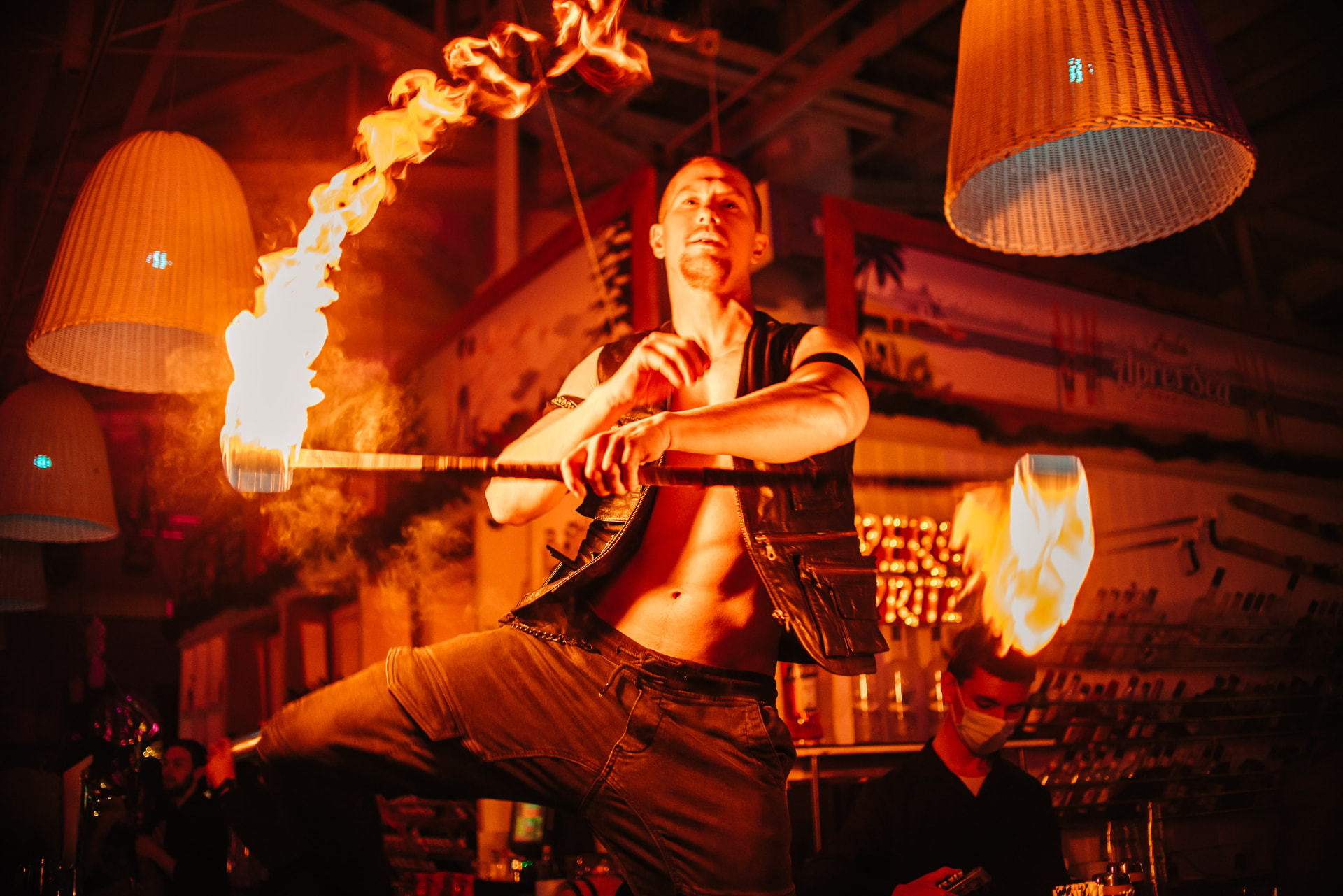 Fire performer creating a flame display at an evening event (photo 6)