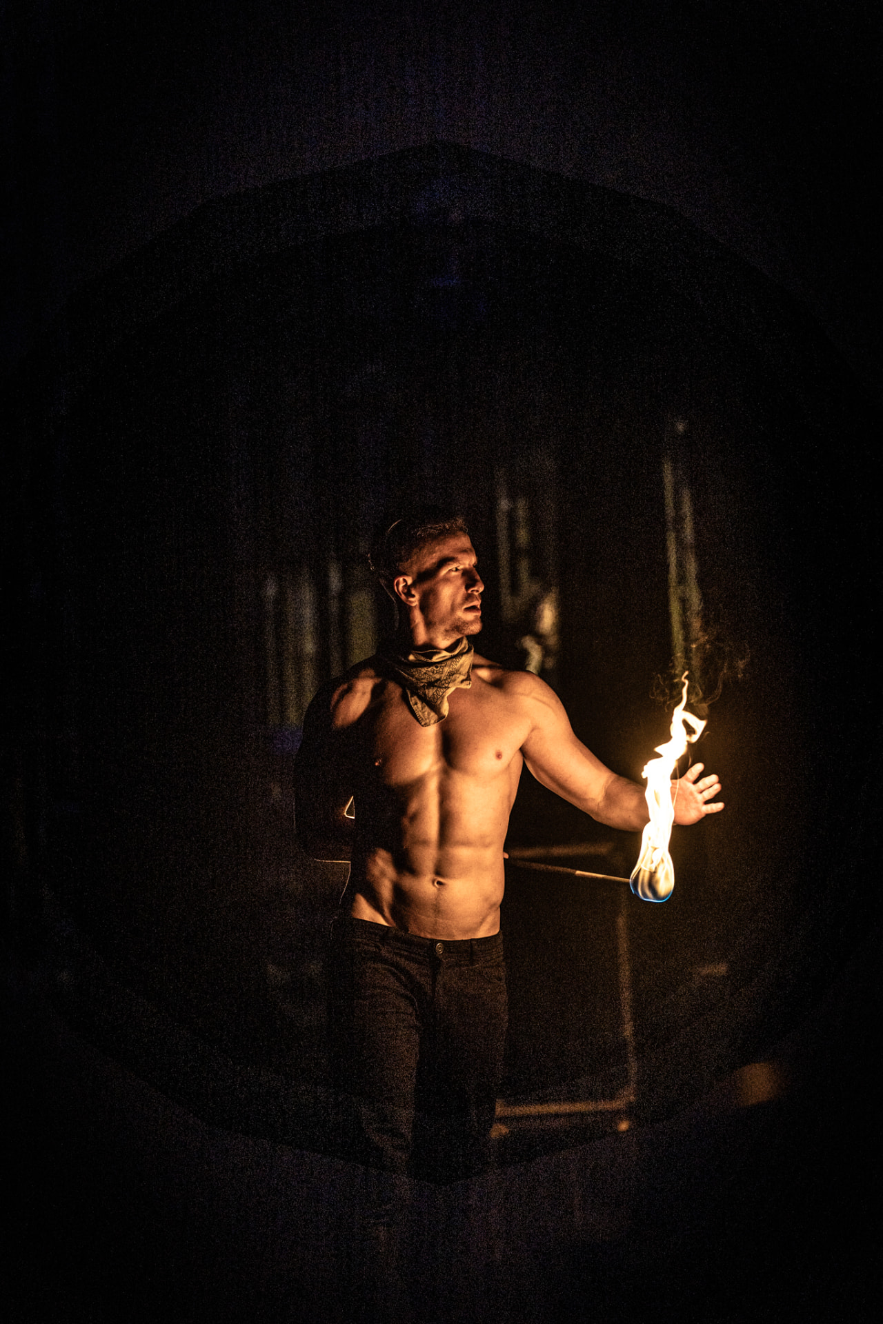 Fire performer creating a flame display at an evening event (photo 7)